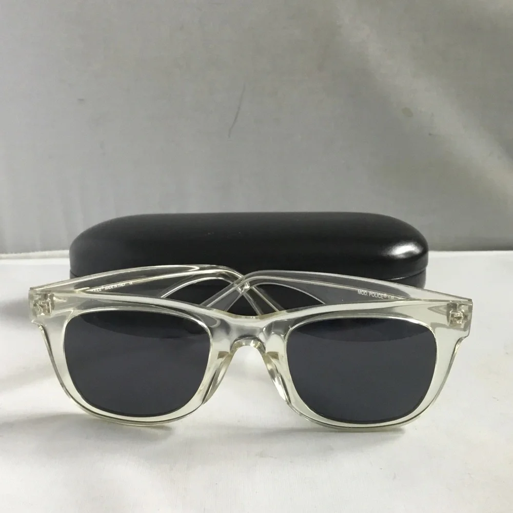 Police Clear Frame Sunglasses with Black Lenses